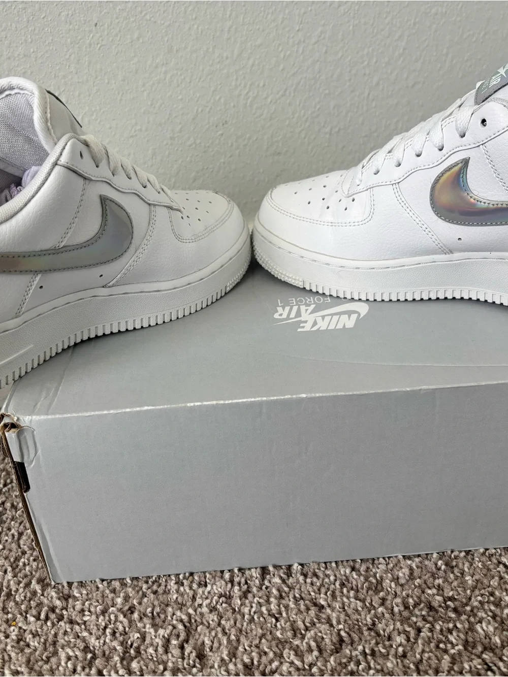 Nike White Low-Top Sneakers with Iridescent Swoosh
